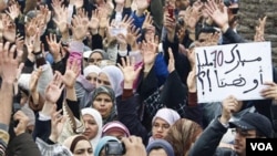 Los manifestanes exigen una nueva constitución que ponga límites a los poderes del rey Mohammed.