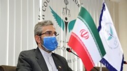 FILE - This handout picture provided by Iran's High Council for Human Rights on May 29, 2021 shows the organization's deputy secretary Ali Bagheri Kani at its premises in the capital Tehran. (Iran's High Council for Human Rights / AFP)