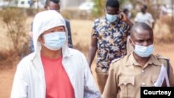 Yunhua Lin, left, at the court in Malawi, 28 Sept 2021. (Courtesy: EIA )