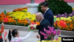 Çin Cumhurbaşkanı Xi Jinping ve Afganistan’ın yeni Cumhurbaşkanı Eşref Gani