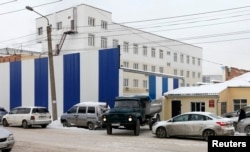 A truck leaves prison hospital number 1 where Nadezhda Tolokonnikova of Pussy Riot group is being held in Krasnoyarsk, Russia, Dec. 19, 2013.