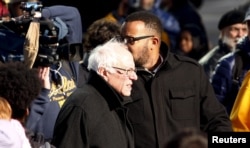 Democratic U.S. presidential candidate Bernie Sanders arrives after participating in a march before "King Day at the Dome 2016" ceremonies in front of the South Carolina State House in Columbia, S.C., Jan. 18, 2016.