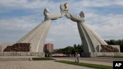 FILE - The Arch of Reunification, a monument to symbolize the hope for eventual reunification of the two Koreas, pictured in Pyongyang, North Korea, Sept, 11, 2018. 