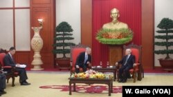 U.S. Defense Secretary Jim Mattis leans in to listen to Vietnamese Communist Party chief Nguyen Phu Trong at the party's headquarters in Hanoi, Vietnam, Jan. 25, 2018.
