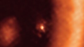 This image, taken with the Atacama Large Millimeter/submillimeter Array (ALMA), shows a close-up view on the moon-forming disk surrounding PDS 70c.