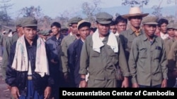Formal integration ceremony in Anlong Veng in February 1999 (Source: Photo by Khun Ly/ Documentation Center of Cambodia Archive)