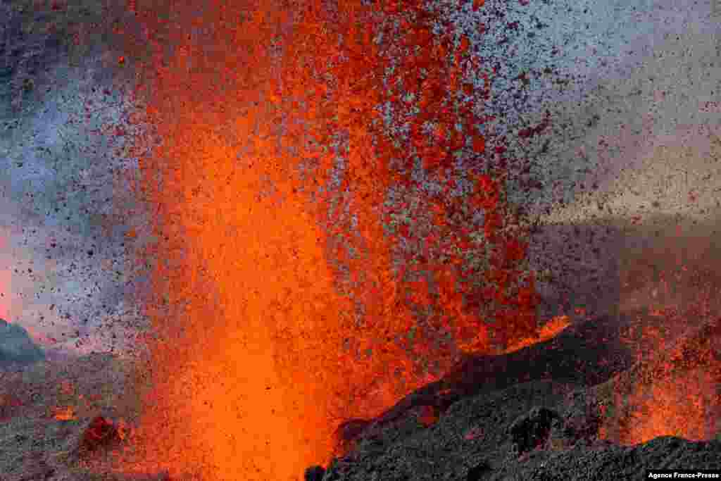 This aerial photograph shows the erupting Piton de la Fournaise volcano on the French Indian Ocean island of Reunion.