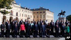 Los líderes del G-20 posan para la foto oficial en San Petersburgo, Rusia.