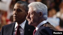Presidente Barack Obama na companhia do presidente Bill Clinton, no penúltimo dia da Convenção Democrata
