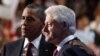 U.S. President Barack Obama (L) embraces former President Bill Clinton onstage after Clinton nominated Obama for re-election during the second session of Democratic National Convention in Charlotte, North Carolina, September 5, 2012