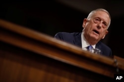 FILE - U.S. Secretary of Defense James Mattis testifies before a Senate Armed Services Committee hearing on Capitol Hill, in Washington, Oct. 3, 2017.