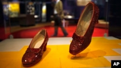 FILE - Dorothy's ruby slippers from "The Wizard of Oz" movie are seen on display at the Smithsonian National Museum of American History in Washington, April 11, 2012.