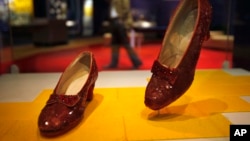 FILE - Dorothy's ruby slippers from"The Wizard of Oz" are seen on display at the Smithsonian National Museum of American History in Washington, D.C., April 11, 2012.