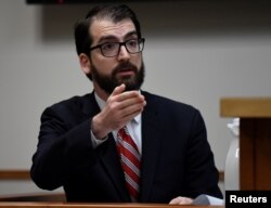 Guardian reporter Ben Jacobs speaks on the stand as Montana Republican congressman-elect Greg Gianforte appears in court to face a charge of misdemeanor assault after he was accused of attacking a reporter on the eve of his election, in Bozeman, Montana, June 12, 2017.