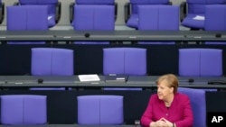 German Chancellor Angela Merkel attends a meeting of the German federal parliament, Bundestag, at the Reichstag building in Berlin, Germany, April 23, 2020.