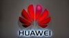 FILE - The Huawei logo is seen at a Huawei store at a shopping mall in Beijing, July 4, 2018. The Chinese-owned telecommunications giant has been blocked from rolling out Australia's 5G network because of security concerns.