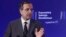 FILE - Greece's Prime Minister Antonis Samaras gestures as he delivers his speech during an agreement signing with the European Investment Bank (EIB) in Athens,June 12, 2013.