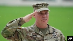 U.S. Maj. Gen. Marcus Evans, commanding general of the U.S. Army's 25th Infantry Division, salutes during a wreath-laying rite at the Manila American Cemetery and Memorial in Taguig, Philippines, Oct. 21, 2024.