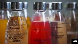 FILE - In this Sept. 2, 2015 file photo, SodaStream products are seen at the SodaStream factory near the Bedouin city of Rahat, Southern Israel. Beverage giant PepsiCo has bought SodaStream for $3.2 billion.