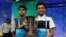 FILE - Co-champions Nihar Janga, left, and Jairam Hathwar hold their trophy upon completion of the final round of Scripps National Spelling Bee at National Harbor, Maryland, May 26, 2016.