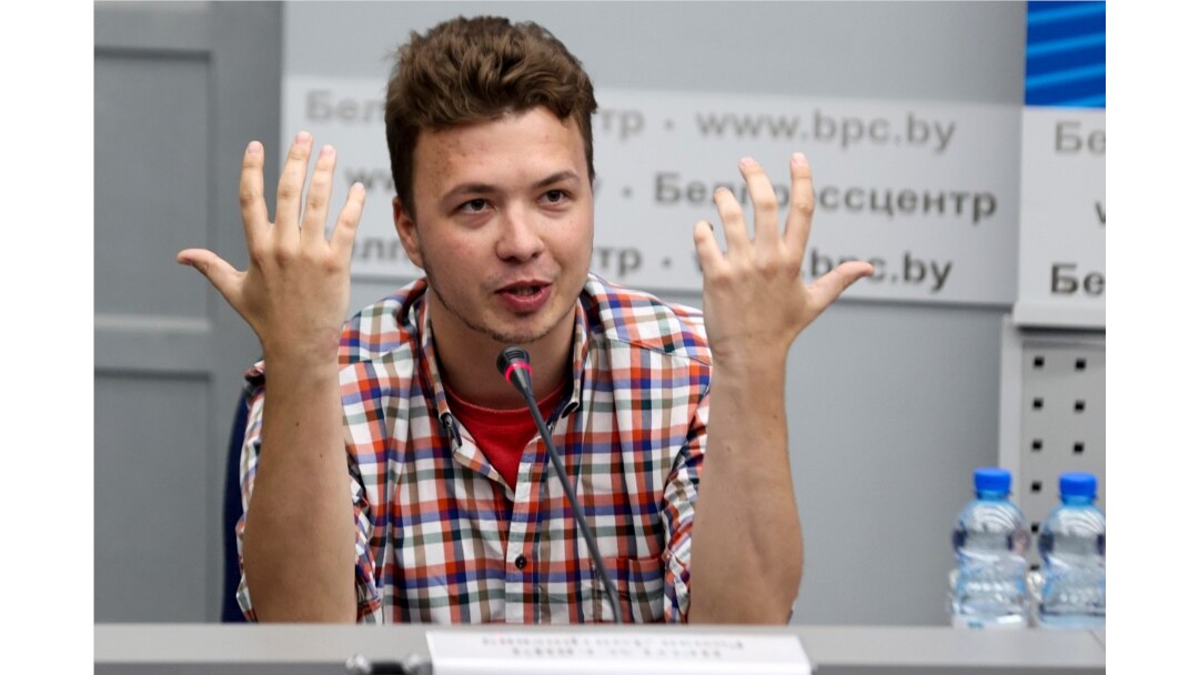 FILE - Belarusian dissident journalist Raman Pratasevich gestures while speaking at a news conference at the National Press Center of Ministry of Foreign Affairs in Minsk, Belarus, June 14, 2021.