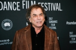 FILE - Mickey Hart poses at the premiere of "Long Strange Trip," a documentary about the Grateful Dead rock group, during the 2017 Sundance Film Festival, Jan. 23, 2017, in Park City, Utah.