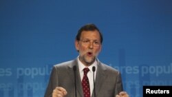 Spain's Prime Minister Mariano Rajoy speaks during a news conference at his Popular Party headquarters in Madrid, May 28, 2012. 