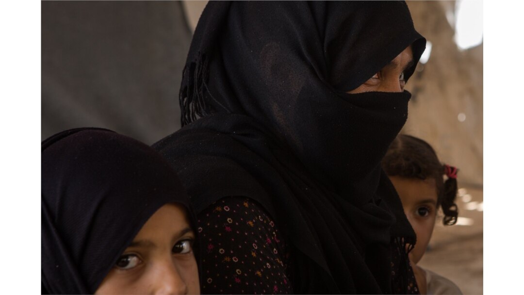 More than 70,000 people stay in tents at Al-Hol Camp in northern Syria. The majority of them are women and children from the last IS-controlled areas; many still hope to see a new 'Caliphate' emerge in the region, Aug. 26, 2019. (Yan Boechat/VOA)