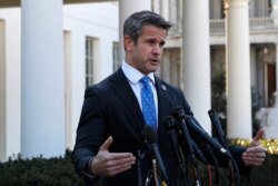 Rep. Adam Kinzinger, R-Ill., speaks to the media, March 6, 2019, at the White House in Washington.