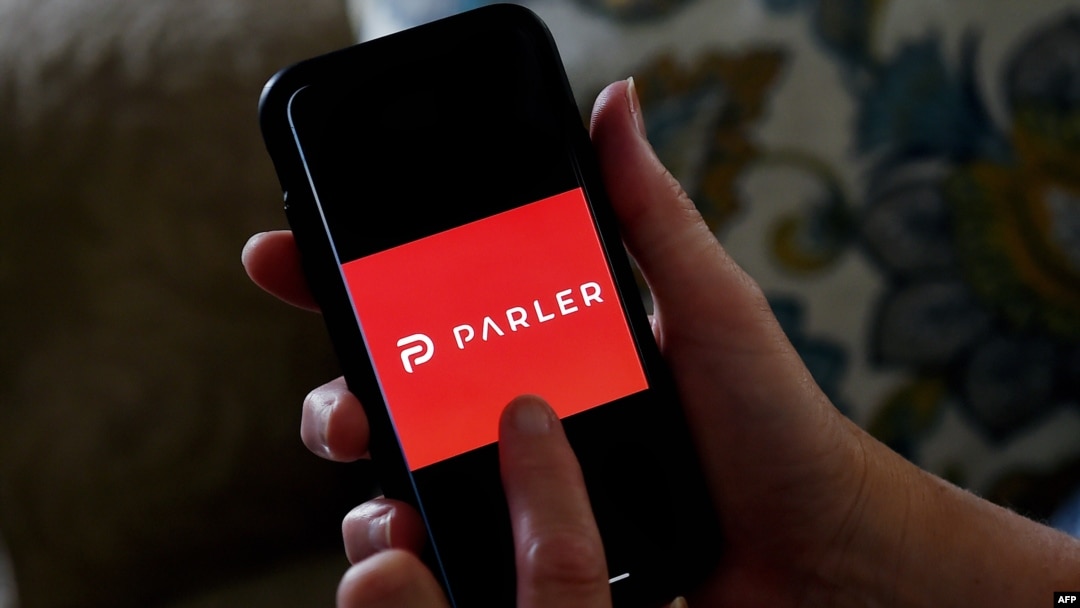 FILE - This photo shows the Parler logo on a smartphone in Arlington, Va., July 2, 2020. 