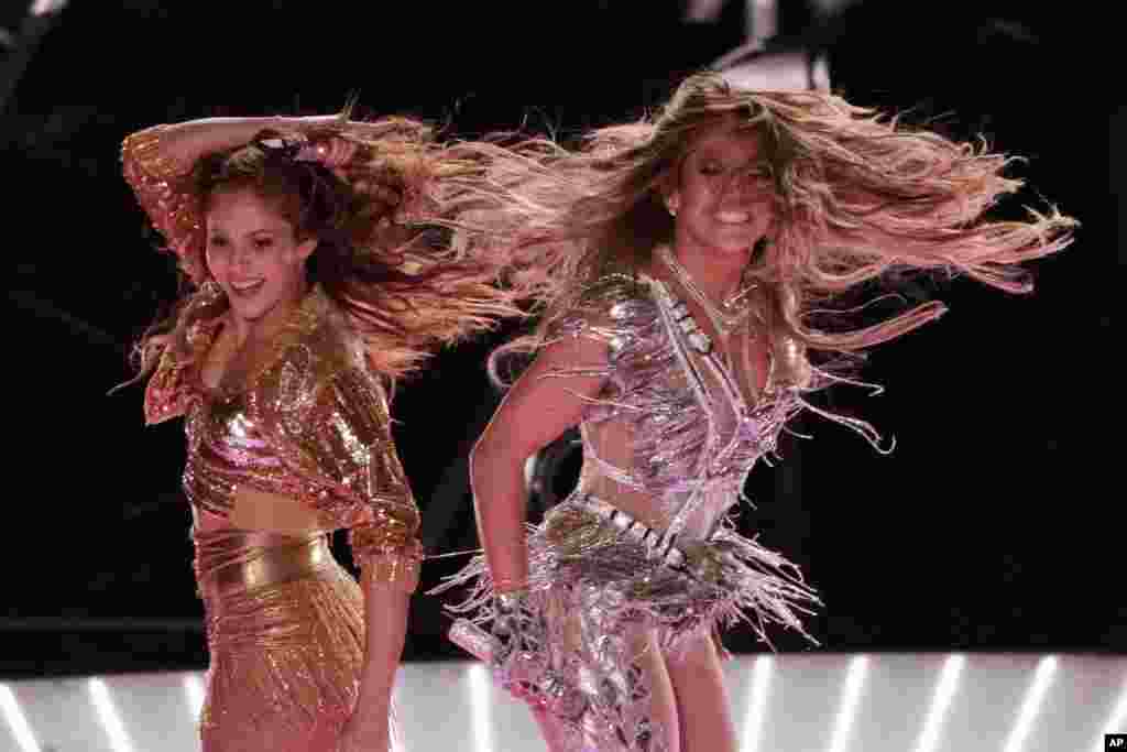 Singers Shakira and Jennifer Lopez perform during the halftime show at the NFL Super Bowl 54 football game between the San Francisco 49ers and Kansas City Chiefs&#39;, Feb. 2, 2020, in Miami.