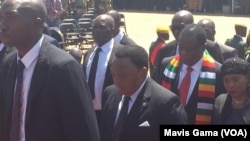 FILE: President Emmerson Mnangagwa, his wife Auxillia, and cabinet ministers.