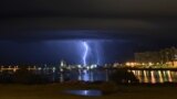Lightning strikes behind the Port of Buceo during a thunderstorm early on Sunday morning in Montevideo, Uruguay.