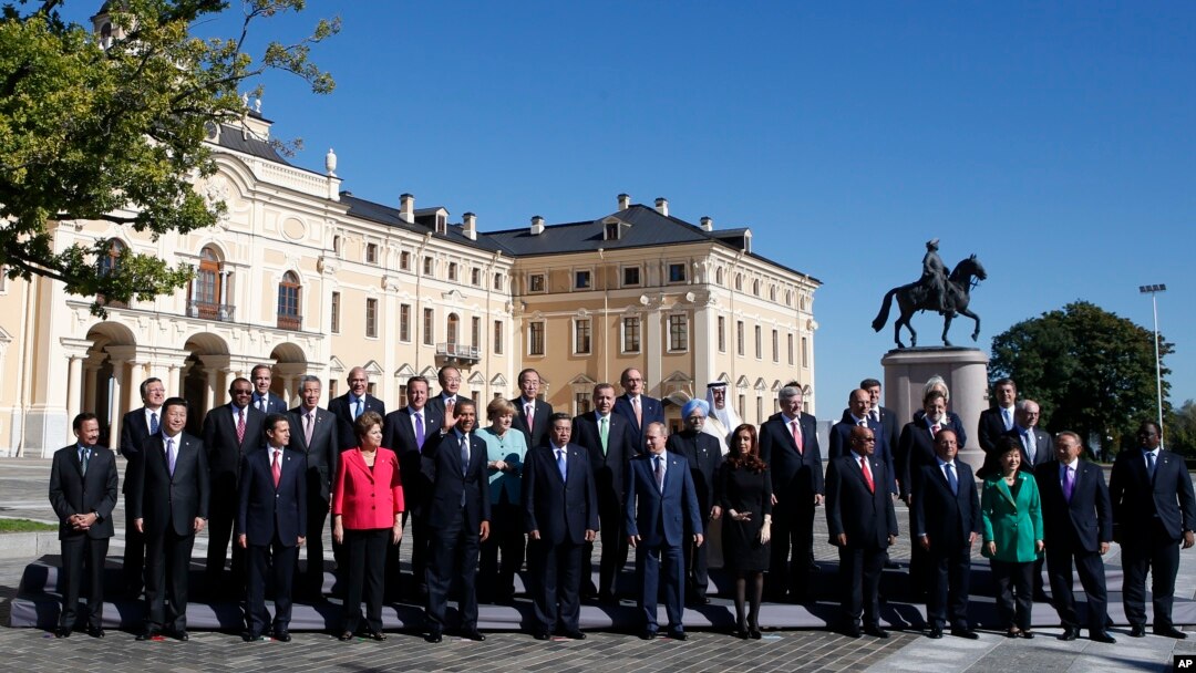 Foto bersama para kepala negara peserta KTTG20 di St.Petersburg (6/9). G20 berkeinginan menaikkan pajak terhadap perusahaan multinasional.