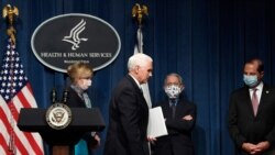 Vice President Mike Pence, second from left, walks off of the stage following the conclusion of a briefing with the Coronavirus Task Force at the Department of Health and Human Services in Washington, Friday, June 26, 2020. Dr. Deborah Birx, left,…