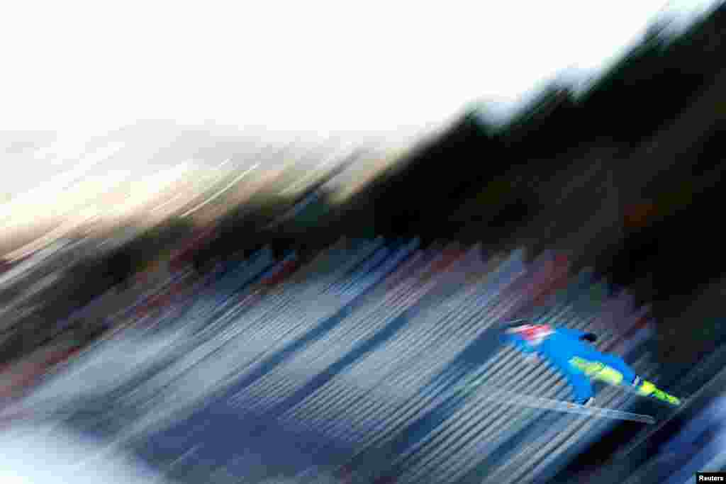 Czech Republic's Ondrej Pazout is seen in action during the men's nordic combined ski jumping competition trial round, in Oberstdorf, Germany.