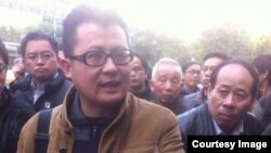 郭飞雄2013年初参与声援广州南方周末员工。（微博图片）