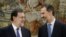 FILE - Spain's Prime Minister Mariano Rajoy (L) talks to King Felipe after taking his oath during a ceremony at Zarzuela Palace in Madrid, Spain, Oct. 31, 2016.