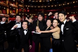 Bong Joon Ho and the cast of "Parasite" pose at the 92nd Academy Awards in Hollywood, Los Angeles, California, U.S., February 9, 2020.