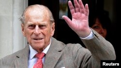 Britain's Prince Philip waves to members of the media as he leaves the King Edward VII Hospital in London June 9, 2012. (File)