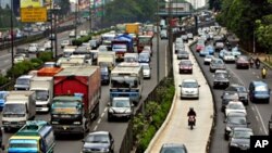 Gridlocked traffic is seen in a busy street, estimated to cause heavy losses in wasted fuels and working hours, and in cargo and passenger transport losses in Jakarta, Indonesia (file photo)