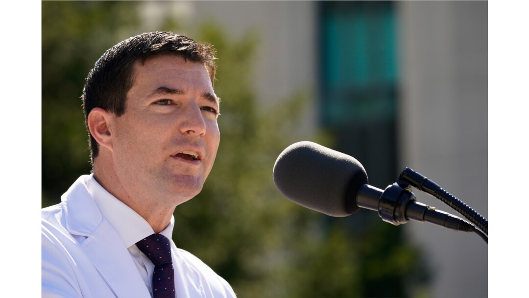 Dr. Sean Conley, physician to President Donald Trump, briefs reporters at Walter Reed National Military Medical Center in Bethesda, Md., Oct. 3, 2020. Trump was admitted to the hospital after contracting the coronavirus.