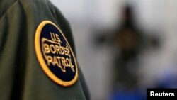 FILE - A logo patch is shown on the uniform of a U.S. Border Patrol agent.