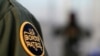 FILE - A logo patch is shown on the uniform of a U.S. Border Patrol agent.