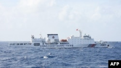 This handout photo taken on Jan. 11, 2025, and released on Jan. 12 by the Philippine coast guard shows a Chinese coast guard ship known as "the monster" sailing some 111 kilometers (69 miles) west of the main Philippine island of Luzon.