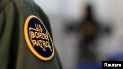 FILE - A logo patch is shown on the uniform of a U.S. Border Patrol agent.