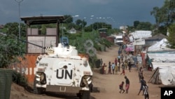 FILE - A United Nations armored personnel carrier stands in a camp for the internally-displaced in Juba, South Sudan, July 25, 2016. In the last three years the conflict in South Sudan has killed tens of thousands of people and displaced more than two million.