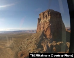 A helicopter ride is the best way to reach Tower Butte.