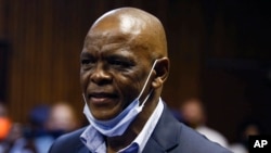 FILE: Then-African National Congress Secretary General Ace Magashule appears for a bail hearing inside the magistrates court in Bloemfontein, South Africa, where he was charged with corruption. taken Nov. 13, 2020.