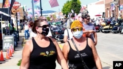 Thousands of bikers attended the opening day of the annual Sturgis Motorcycle rally, Aug. 7, 2020, in Sturgis, S.D. Among the crowds of people, a handful wore face masks to prevent the spread of COVID-19. 